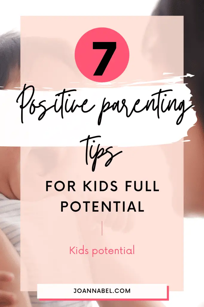 Pin image with text - / positive parenting tips for kids full potential- in front and a photo of a mother holding a smiling baby high in her face level in the back of the image